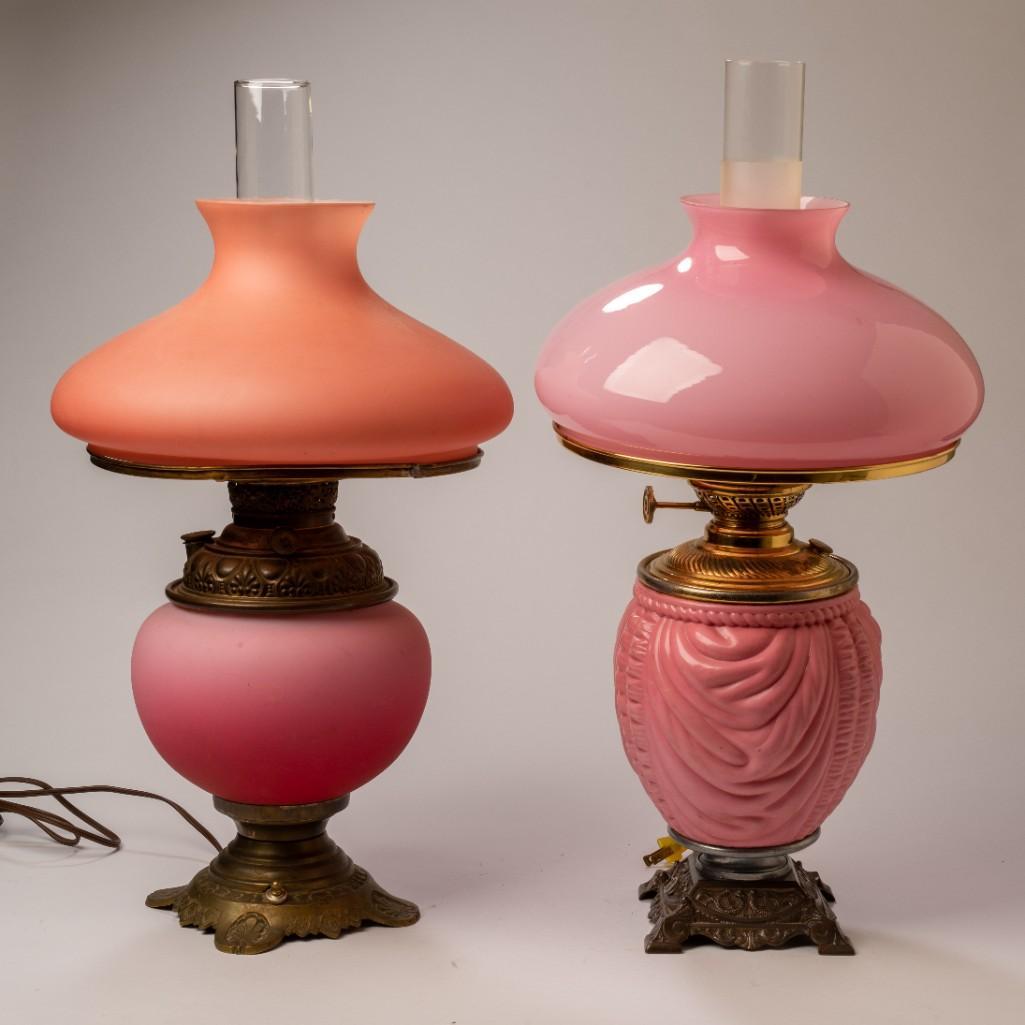 Two Pink Satin Cased Glass Gone With the Wind Lamps.: Victorian era, now fitted for electricity, height of tallest 23 inches.