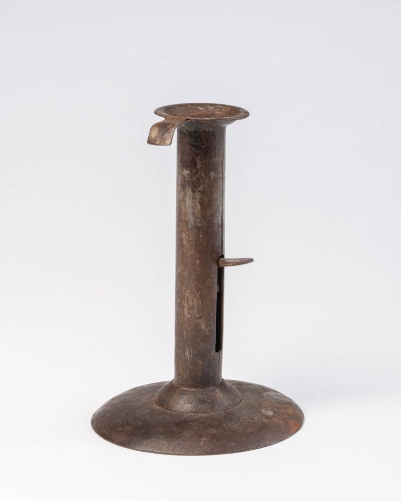 Tin Hog Scraper Candlestick.: Height 6 inches.