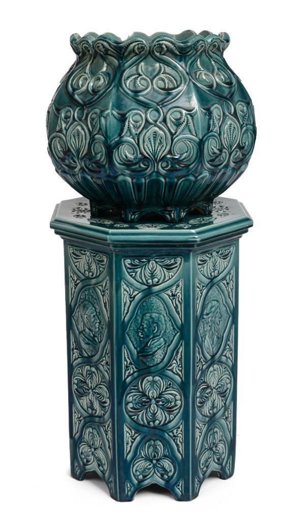 English Orientalist Majolica Jardiniere and Pedestal.: Pedestal decorated with depictions of English and Middle Eastern dignitaries. Height of pedestal 20 inches, height of jardiniere 13 inches.