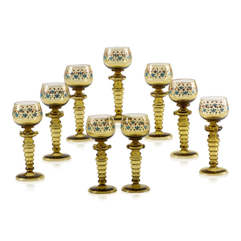 Set of 9 Fritz Heckert Enameled Bohemian Wine Glasses.: Circa 1900. Height 7.5 inches.