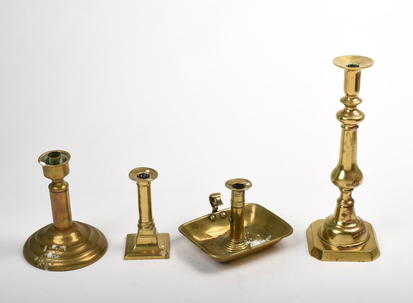Four Brass Candlesticks. (1 of 1)