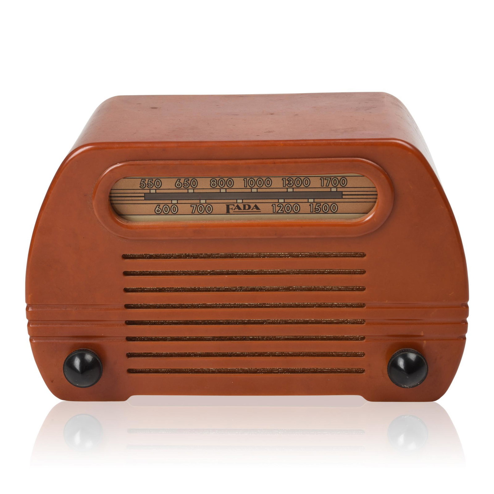 Fada Streamliner Bakelite Radio, Circa 1951.: Width 11 inches, height 7 inches. Fada Streamliner radios were one of the first consumer goods to be made in plastic. Fada was one of over 600 manufacturers of radios in the 1930s through the late 195