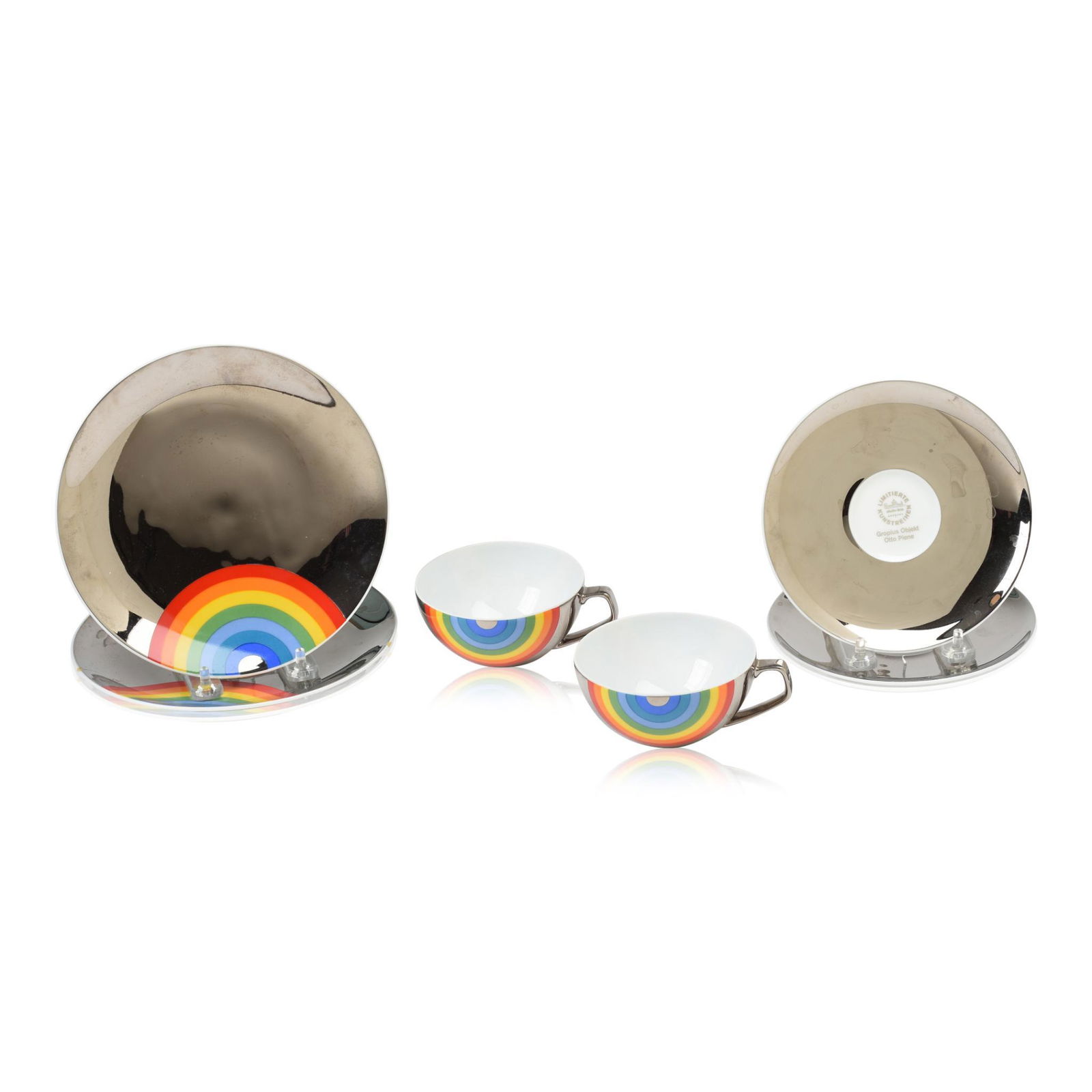 Six Pieces Otto Piene for Rosenthal Rainbow Wares.: Two teacups, two saucers, and two luncheon plates. Repaired crack to one plate.