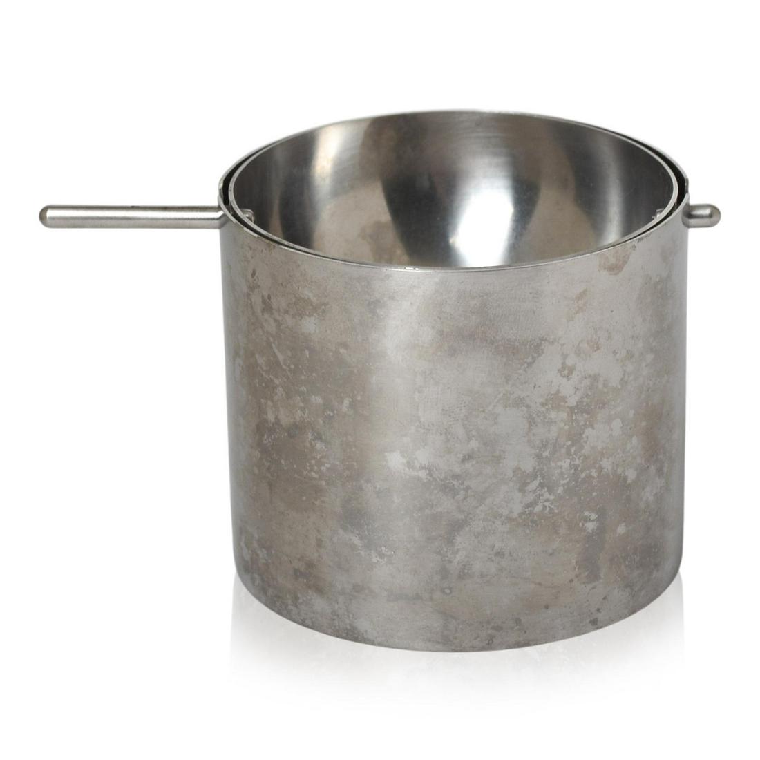 Arne Jacobsen "Cylinda" Revolving Ashtray: Designed for Stelton, stainless steel, 1960s, height 2.5 inches.