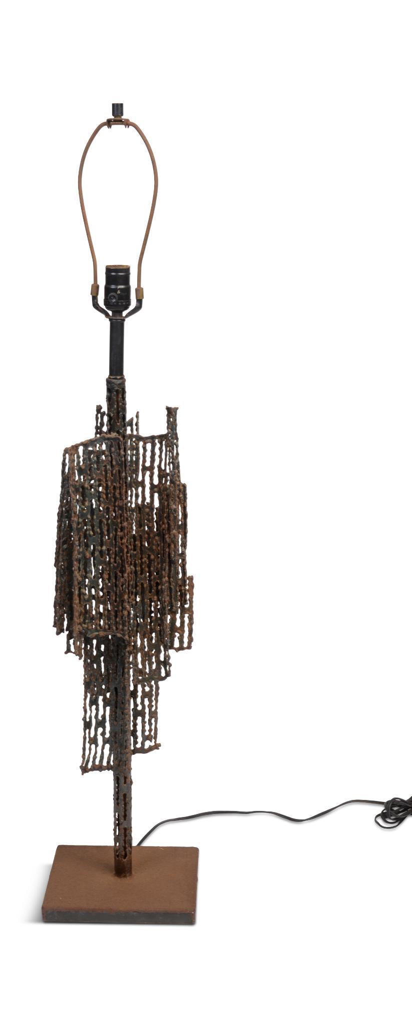 Marcello Fantoni Brutalist Table Lamp: Overall height 42.5 inches. Welded and pierced metal, signed "Fantoni Firenze Italy Raymor" on the bottom, surface rust,