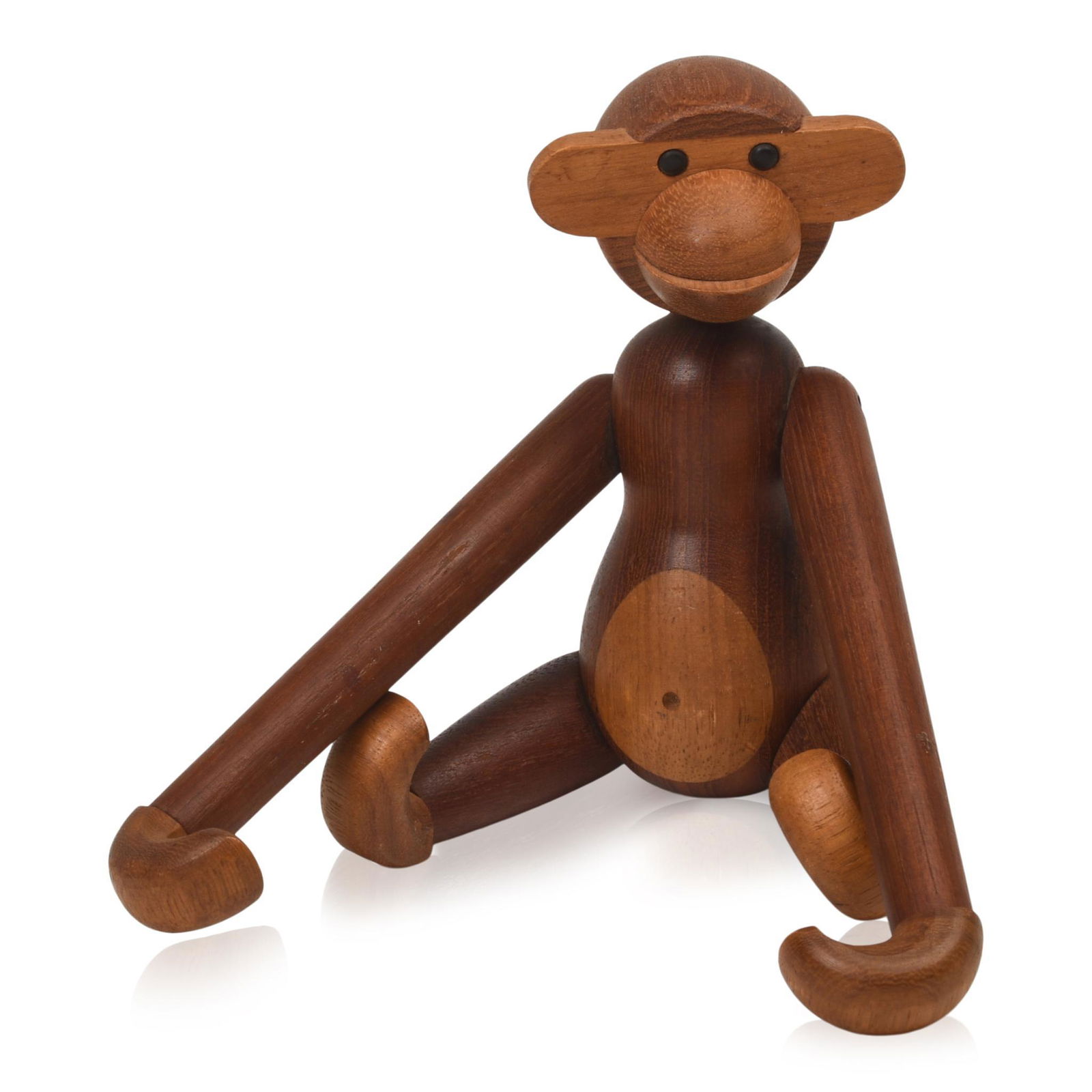 Kay Bojesen Articulated Wooden Monkey: Denmark, c. 1960s, Teak and Oak, unsigned. Height 7.5 inches