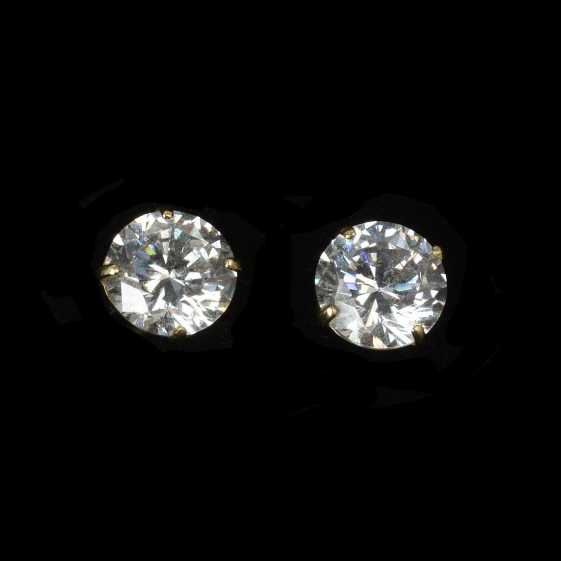 14K Yellow Gold & Cubic Zirconia Stud Earrings.: 1.3 grams, 7mm CZ.