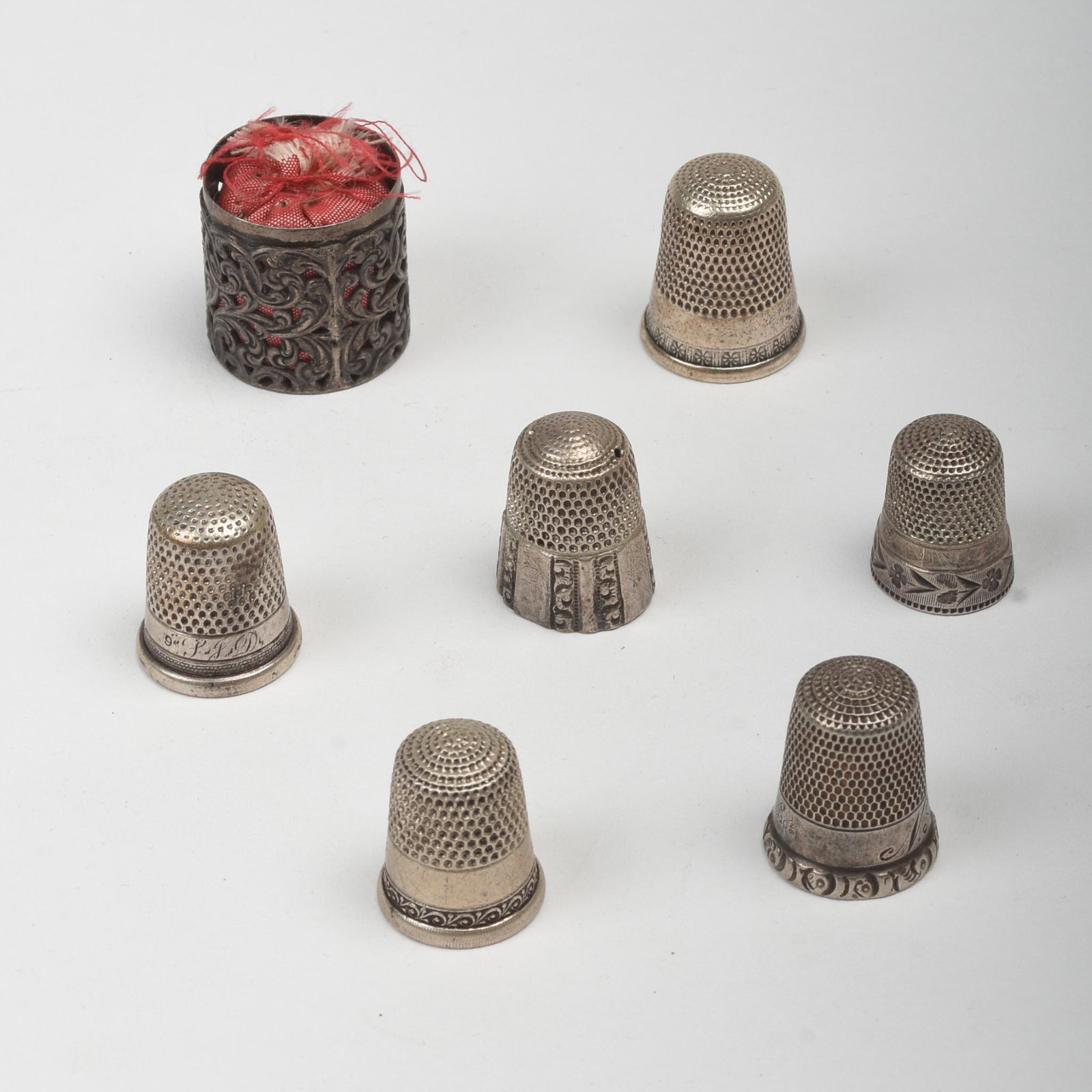 Six Sterling Silver Thimbles.: Together with small silver box.