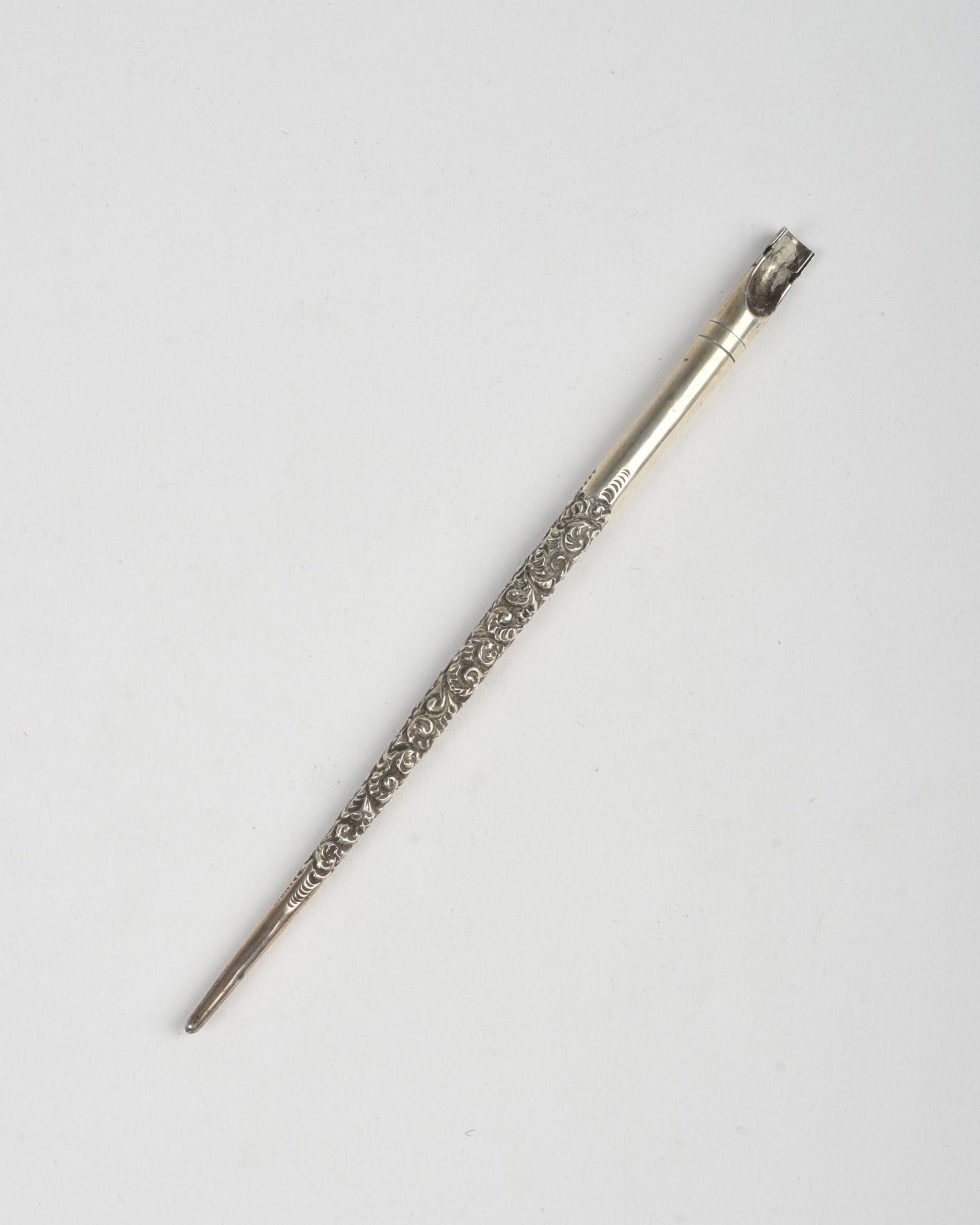 Victorian Sterling Silver Repousse Quill Scroll Dip: Length 6.375 inches.