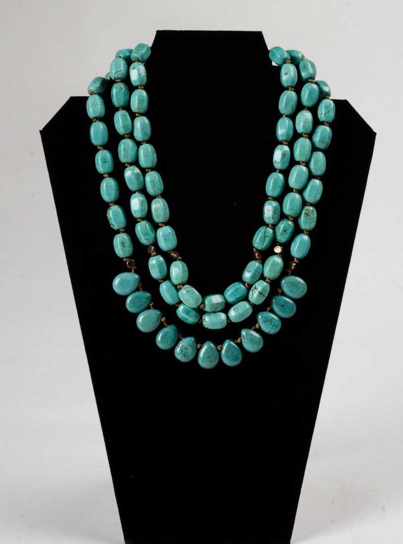 Sterling and Turquoise Three Strand Necklace.: Hand knotted. American Indian. Length 18 inches.