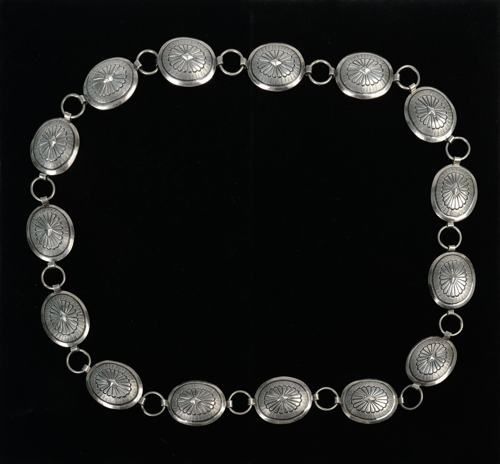 Concho Sterling Silver Belt.: Tested sterling, unsiged. Total length 39 inches. Weight 210 grams.