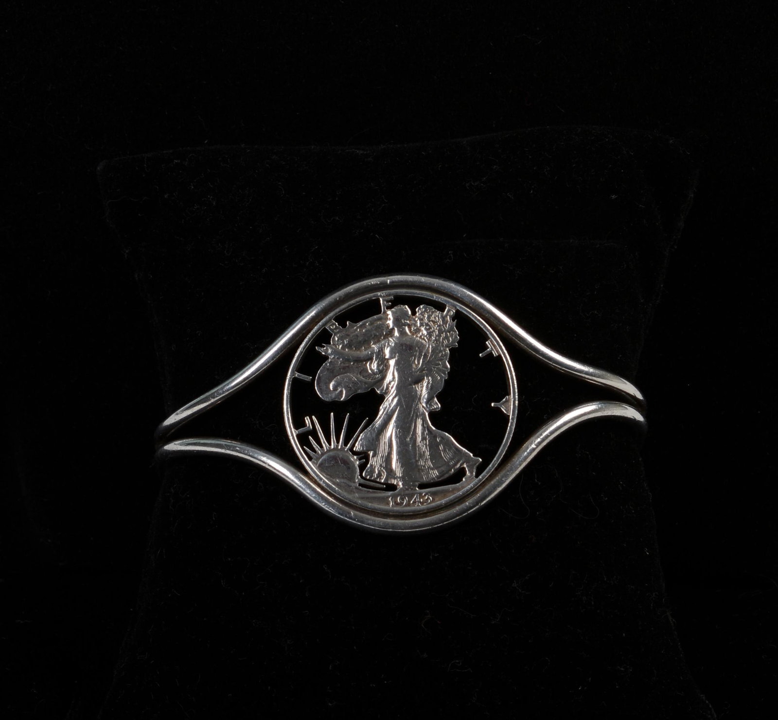 Sterling Silver Liberty Cutout Coin Cuff.: Width 2.5 inches. Diameter of coin 1.25 inches.