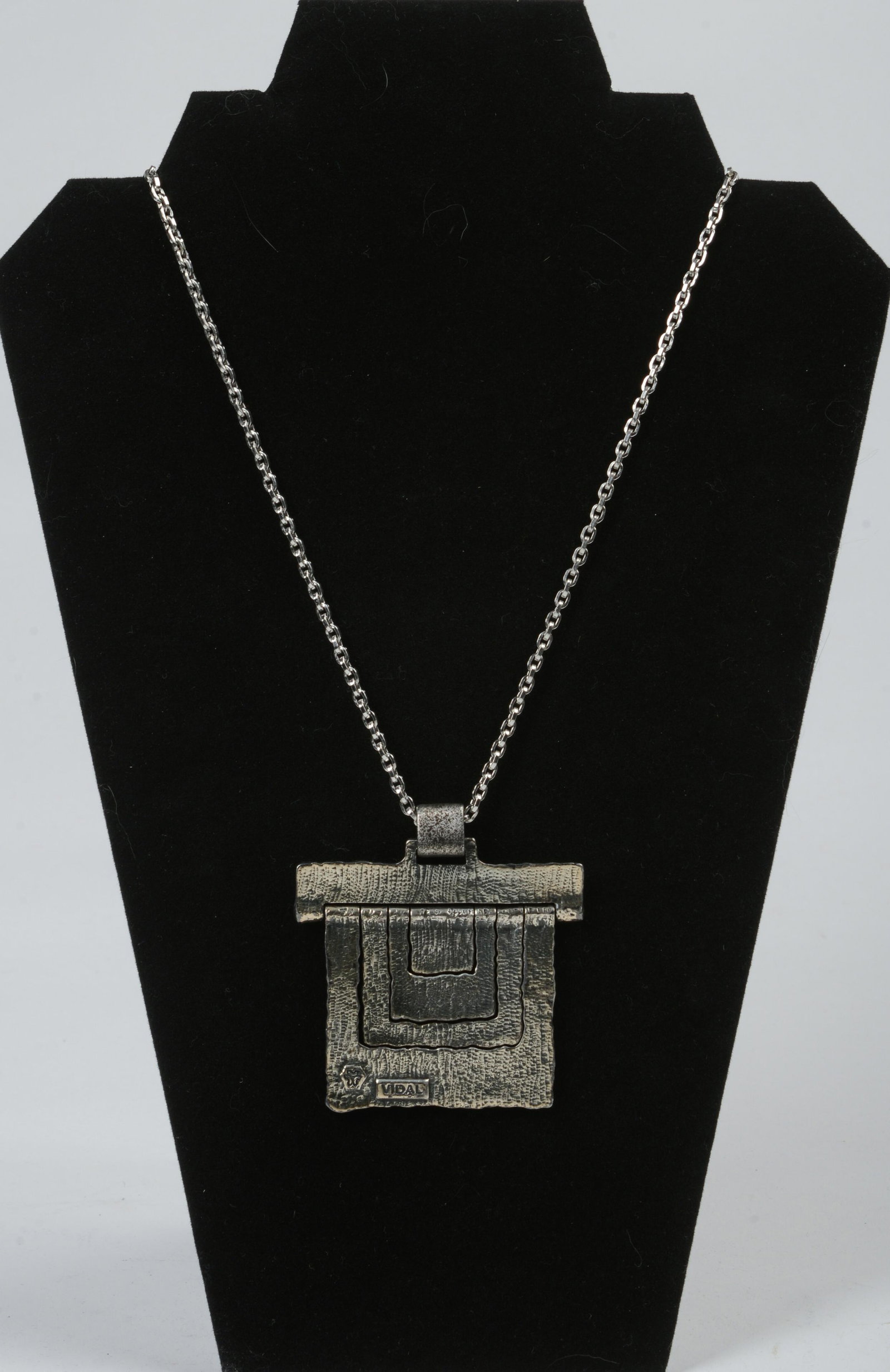 Vidal Brutalist Cutout Necklace.: Length of chain 28 inches. Pendant 2.75 inches by 2.5 inches.