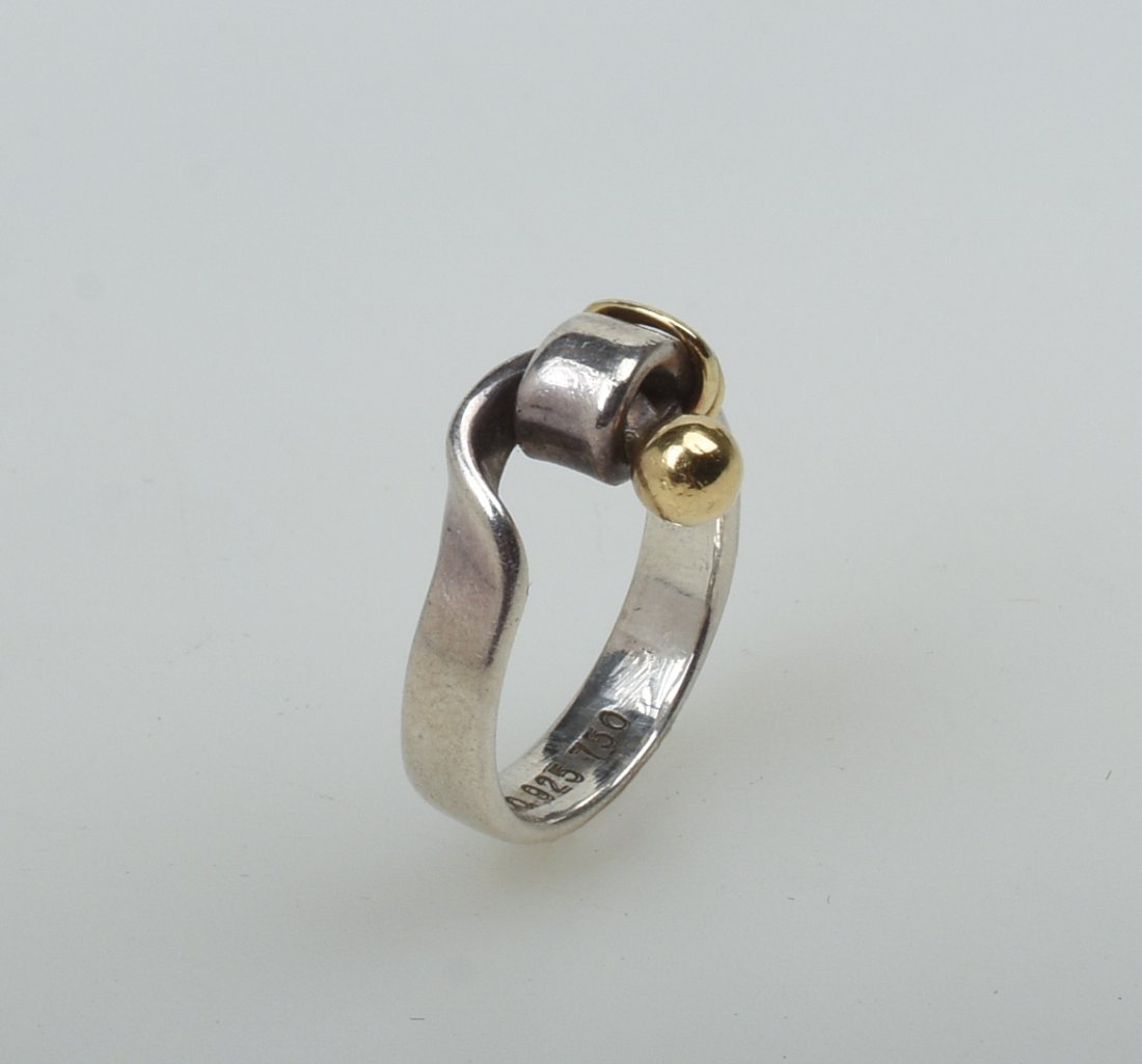 Tiffany & Co. Gold and Sterling Ring.: 18c gold. Size 3.25.
