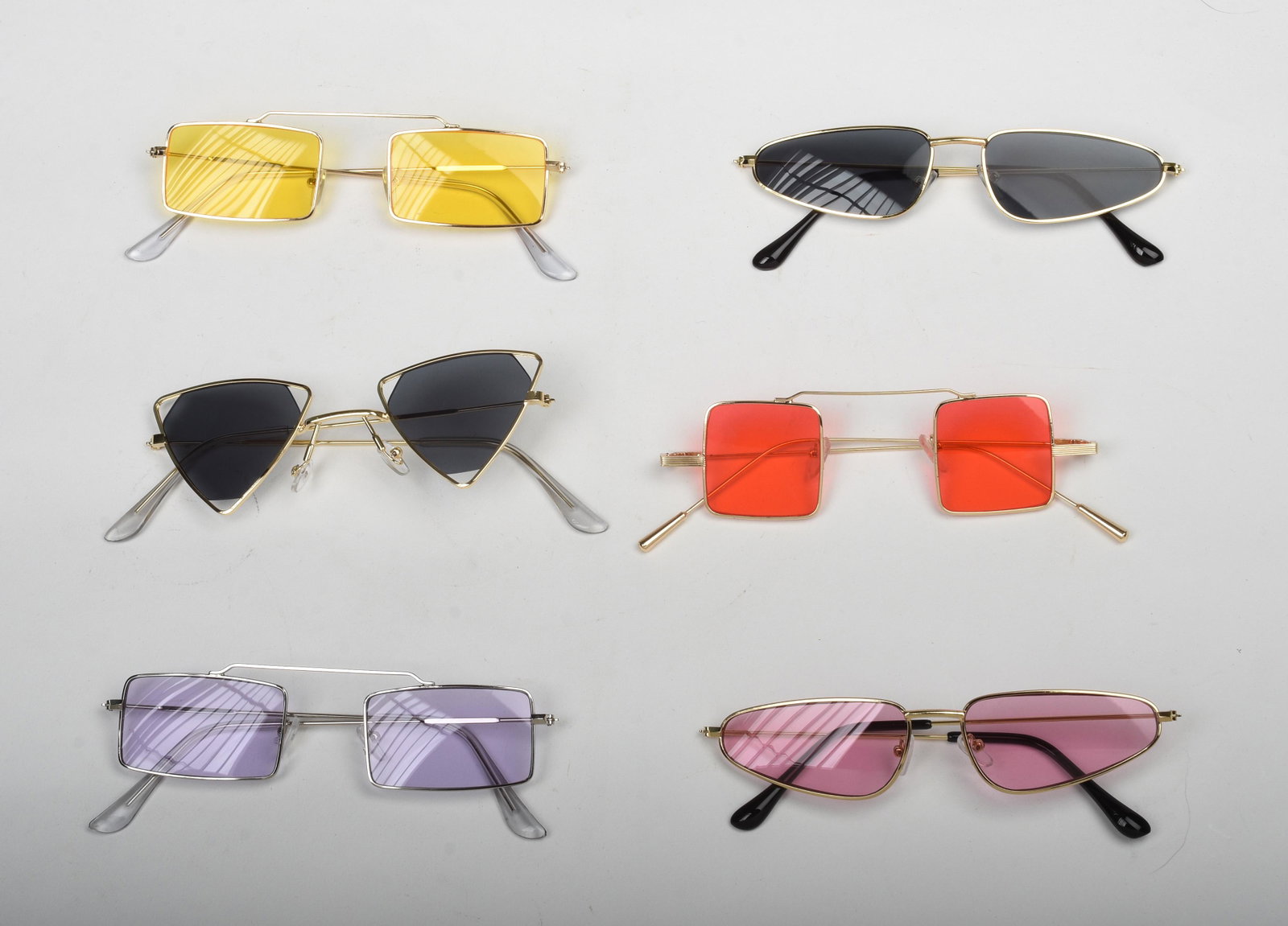 Six Pairs of Unique Sunglasses.: .