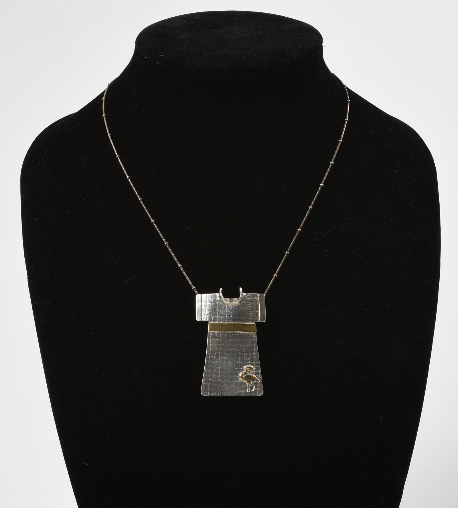 Soyka Horosko Sterling Necklace with Garment Shaped: With small flamingo relief. Stamped Soyka Horosko, handmade USA. Length 15 inches.