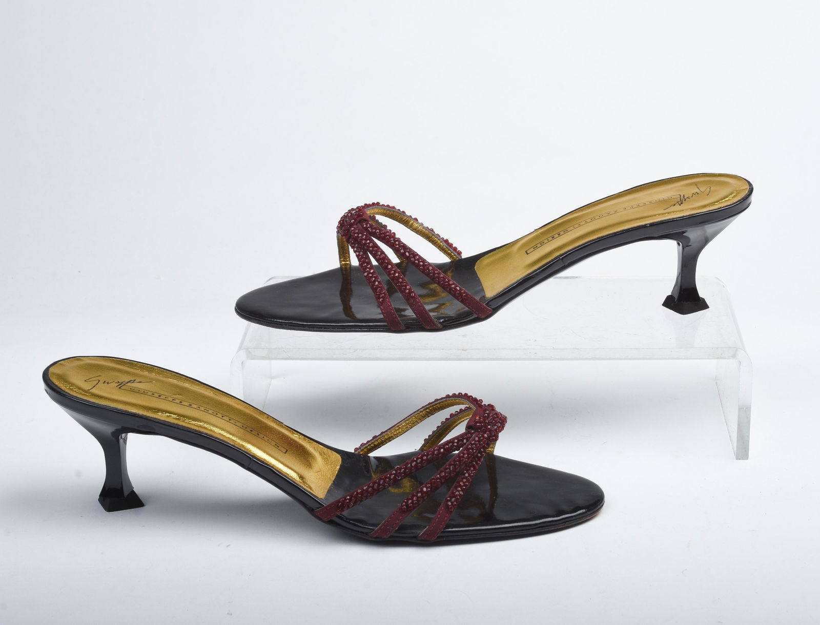 Pair of Black and Beaded Giuseppe Zanotti Kitten Heel: With red beads. Size 38. Condition: good. Heel 2 inches.