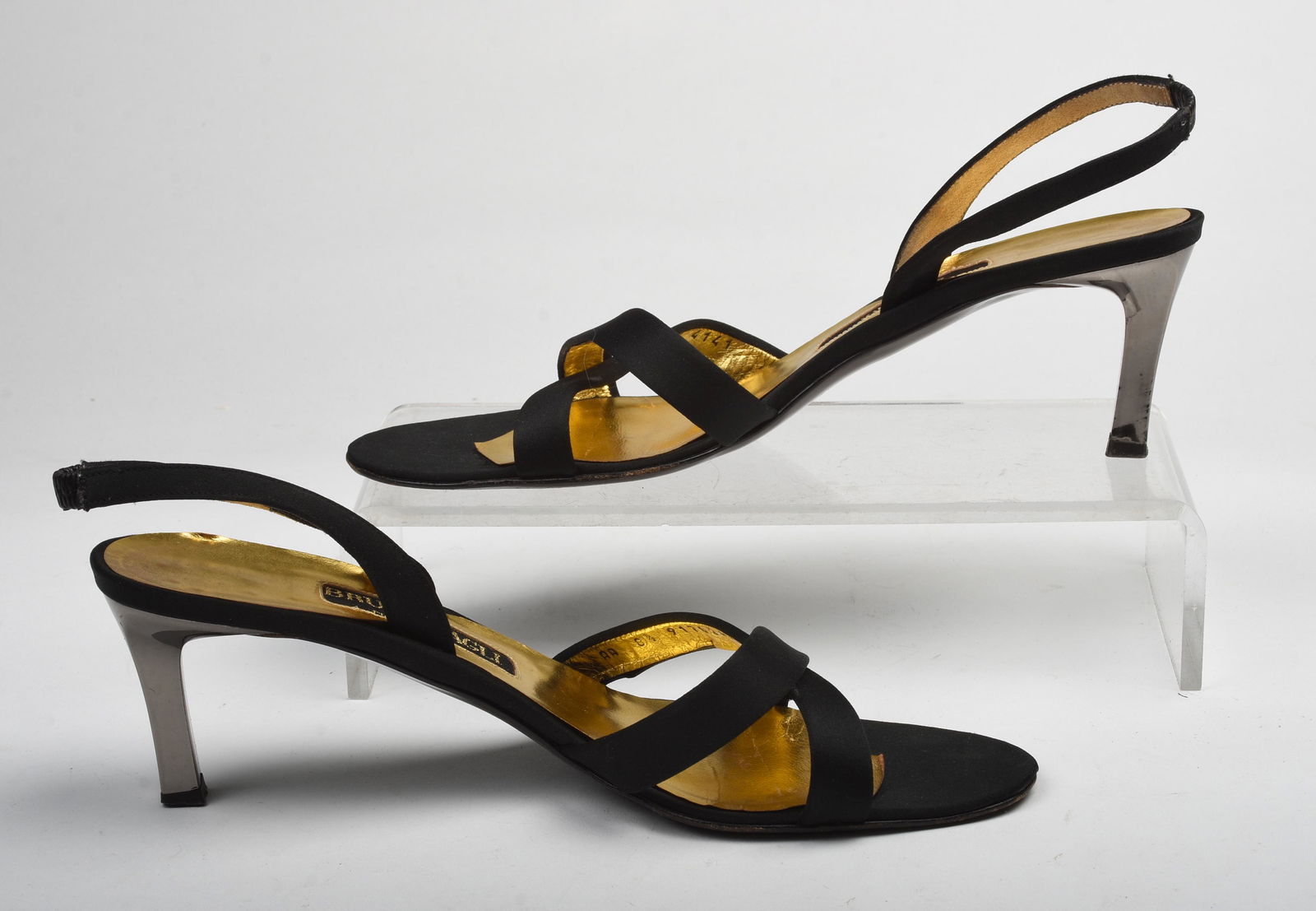 Pair of Black Bruno Magli Couture Slingback Heels.: Fabric coverd straps. Size 8.5 AA. Condition: good. Heel 2.5 inches.