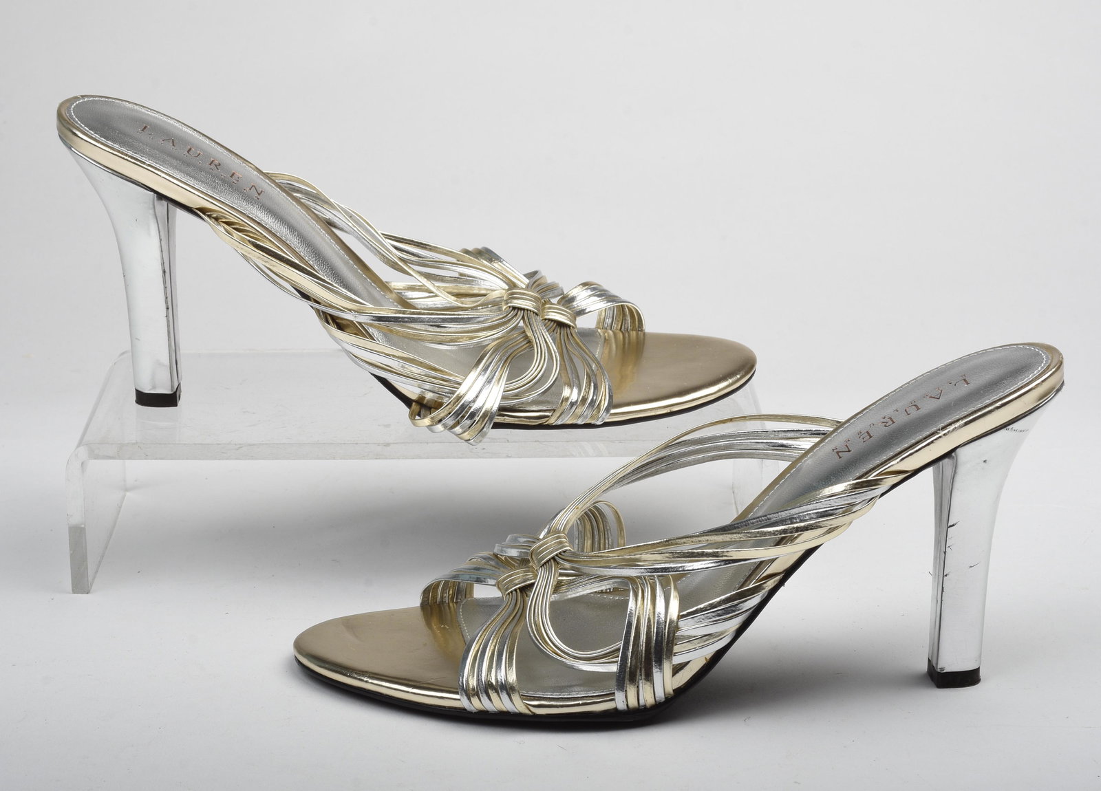 Pair of Silver and Gold Lauren Sandal Heels.: By Ralph Lauren. Size 9.5M. Condition: good to fair; some dents in heel. Heel 3.75 inches.