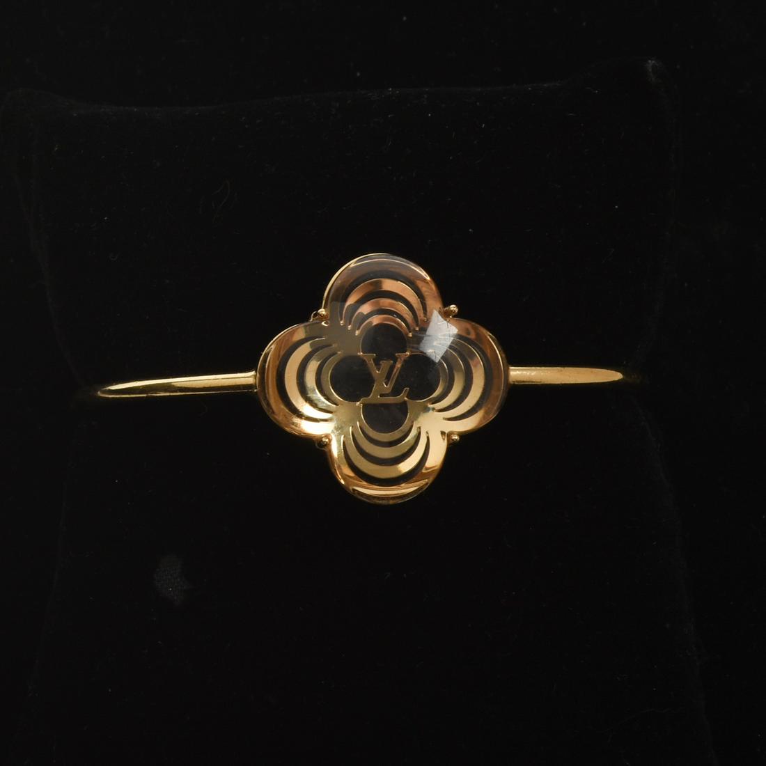 Louis Vitton a La Folie Bracelet.: With LV mongram. From the 'a La Folie' jewelry line. New with box.