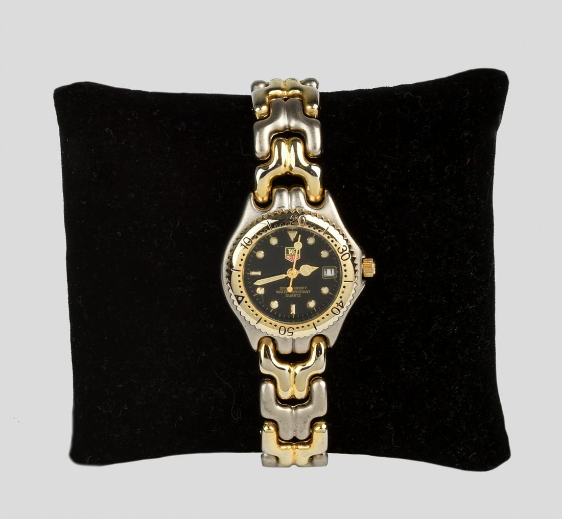 Women's Tag Hauer Watch.: Stainless steel. Diameter of band 6 inches.
