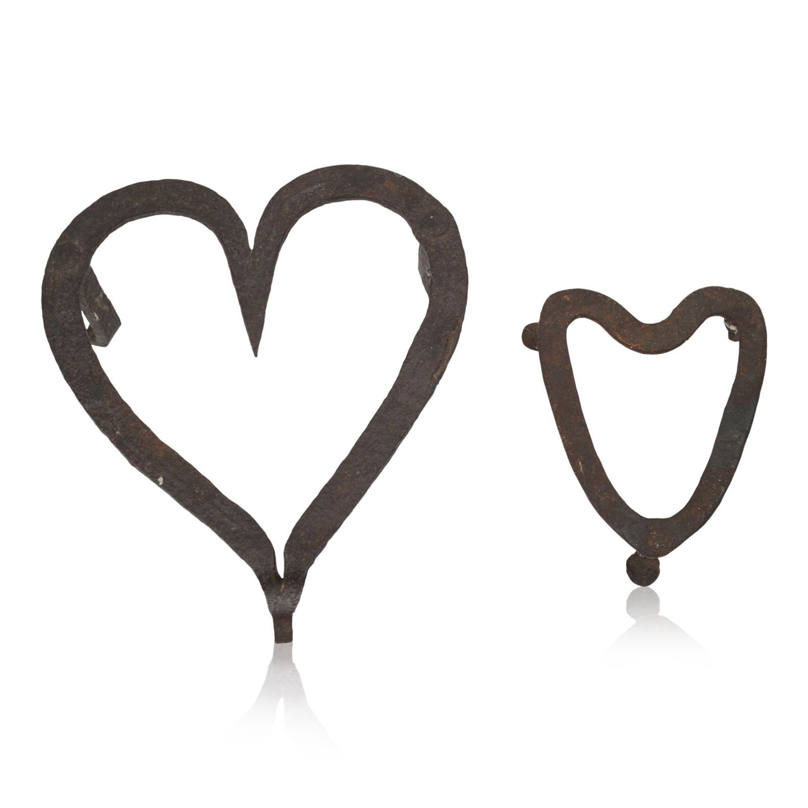 Two Wrought Iron Heart Shaped Trivets.: 8 x 7.35 and 5 x 4 inches.