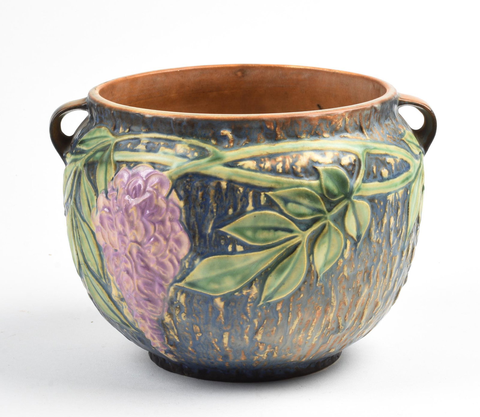 Roseville Wisteria Jardiniere.: Height 7 inches, width over handle 9 inches. With paper label.