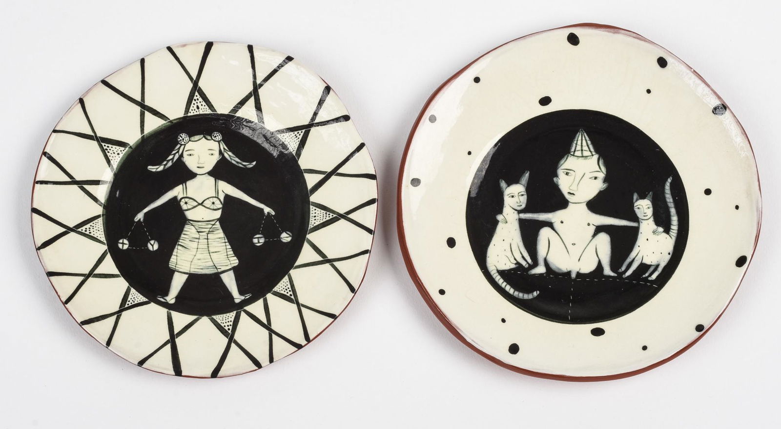 Two Small Decorative Plates. (1 of 3)
