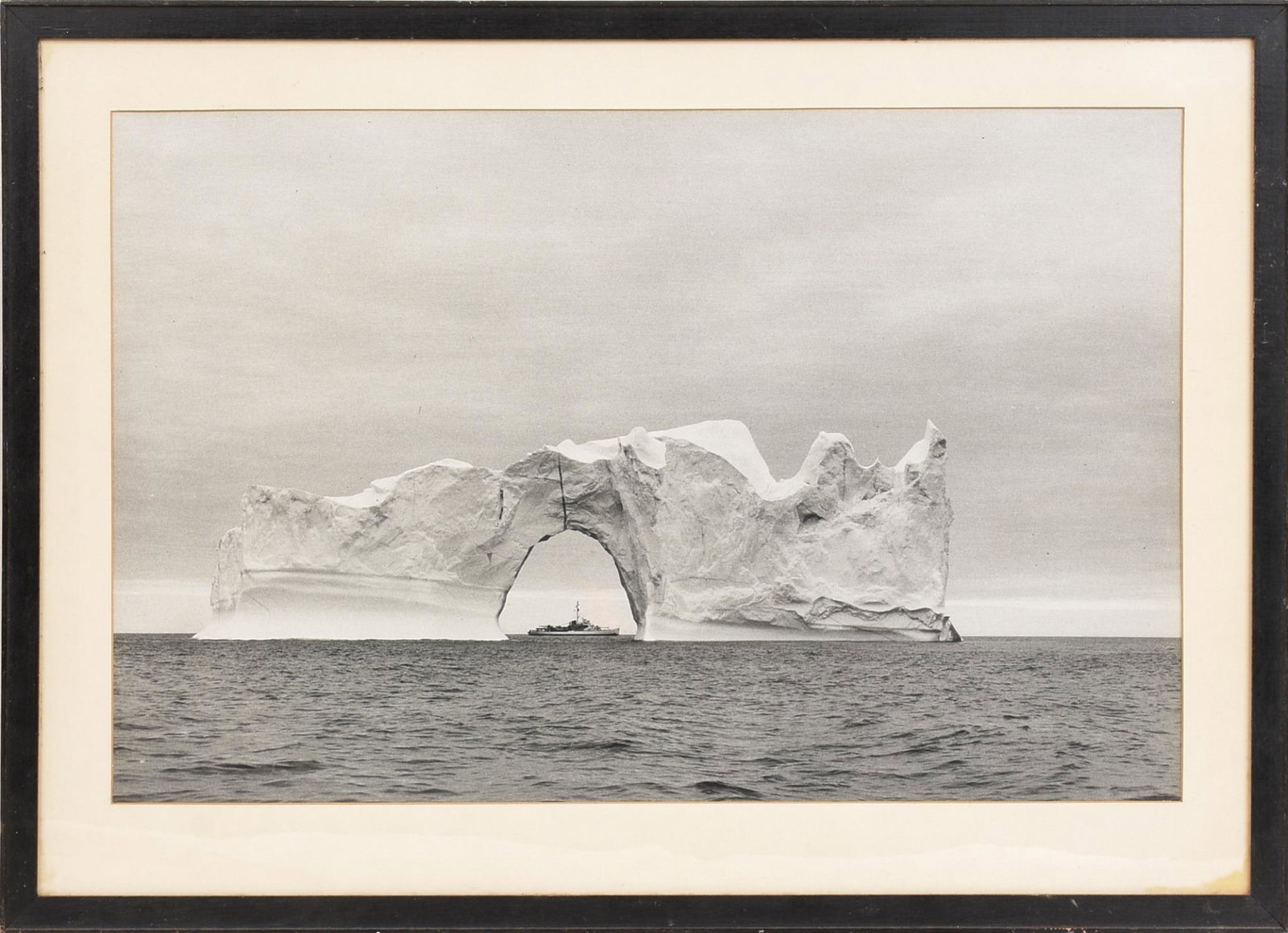 Black and White Photograph of Ship & Iceberg.: Pencil marked on back Elmo G. Jones, Eastwind, 1952. Frame 18 x 25 inches.