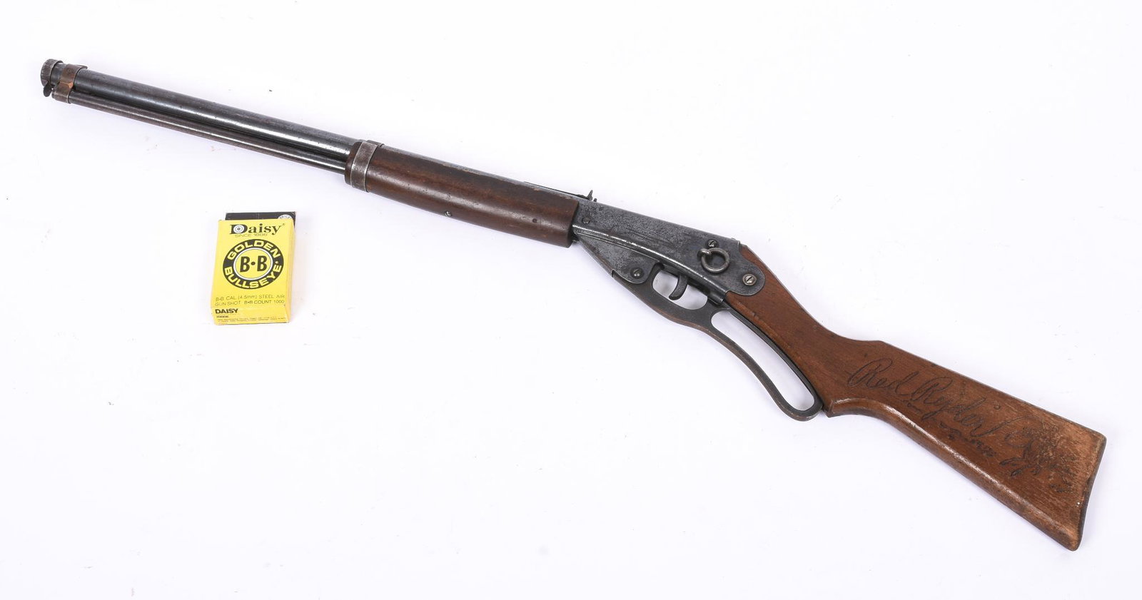 Daisy Red Rider Carbide BB Gun.: Together with a box of BBs.