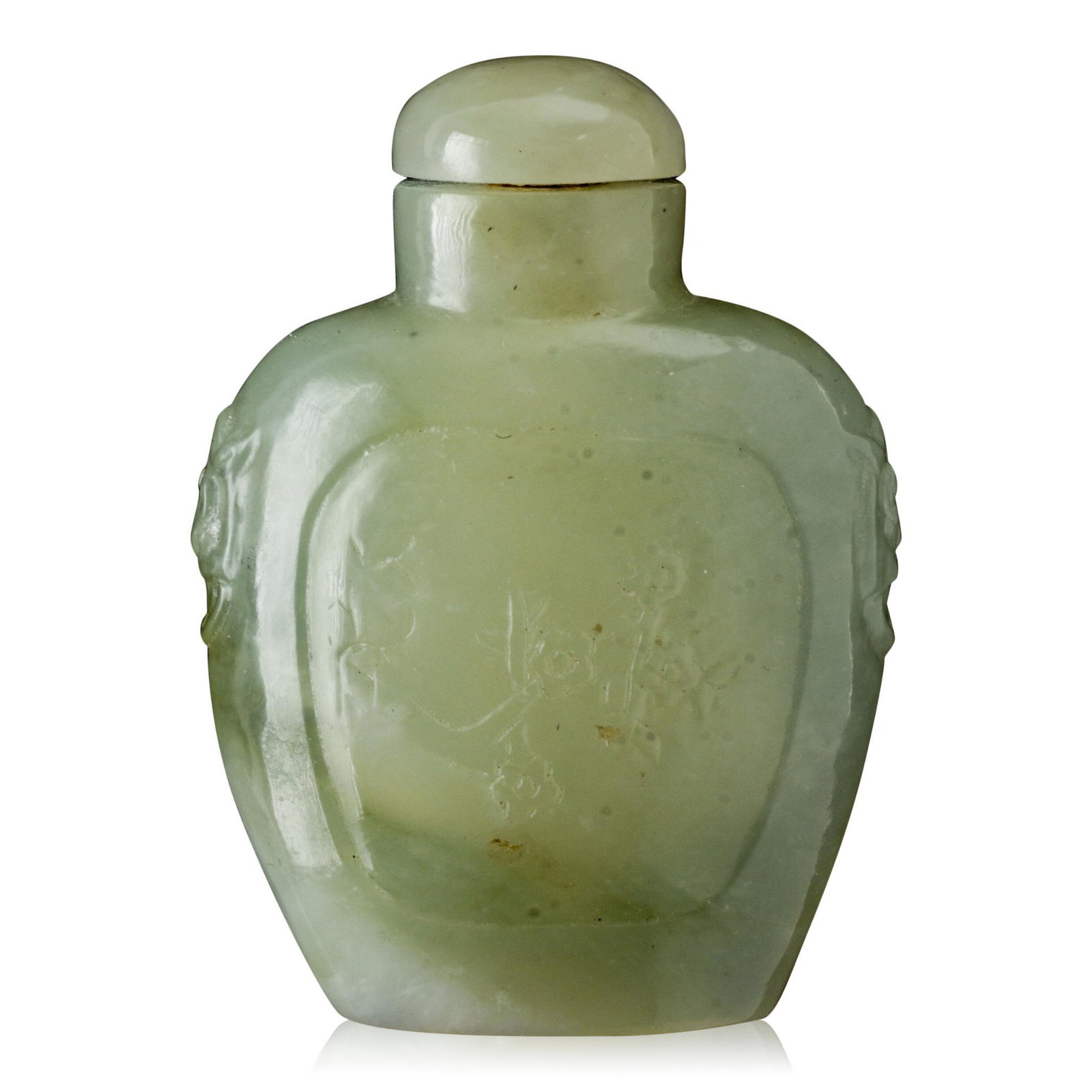 Chinese Carved Jade Snuff Bottle: The sides carved with flowering prunus branches, 2.5 x 2 inches.