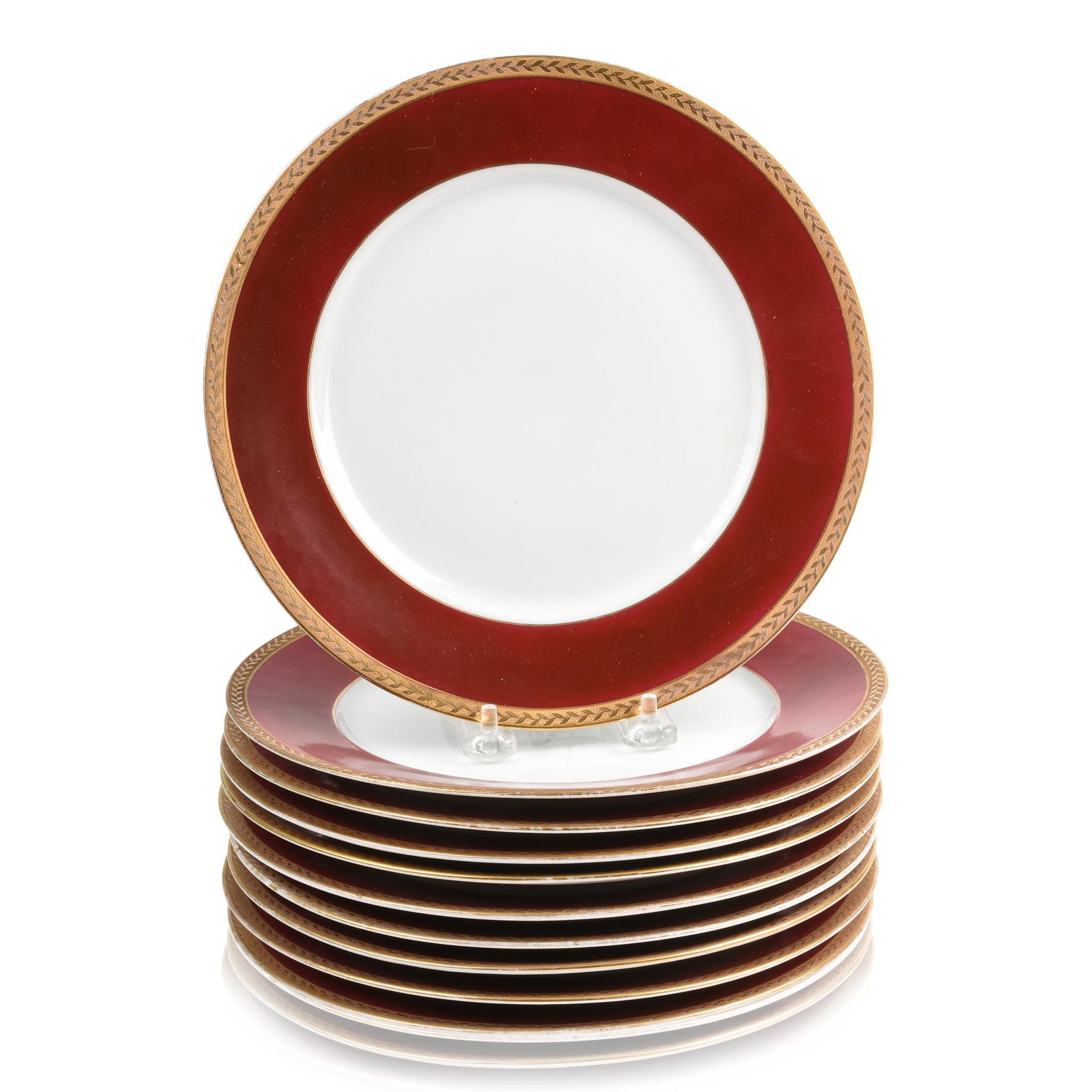 Set of Ten Bavarian Porcelain Dinner Plates: Set of Ten Bavarian Porcelain Dinner Plates, Royal Bayreuth, After 1902, the sang de boeuf rim within a gilt chased berried vine border, printed PT coat-of-arms mark and Royal Bayreuth/ BAVARIA in und