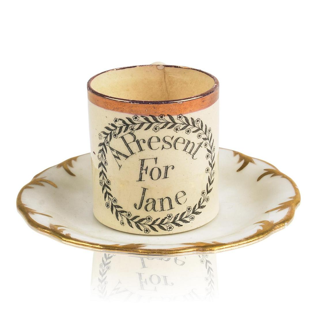 A Present For Jane Children's Mug.: Height 2 inches, together with a saucer.
