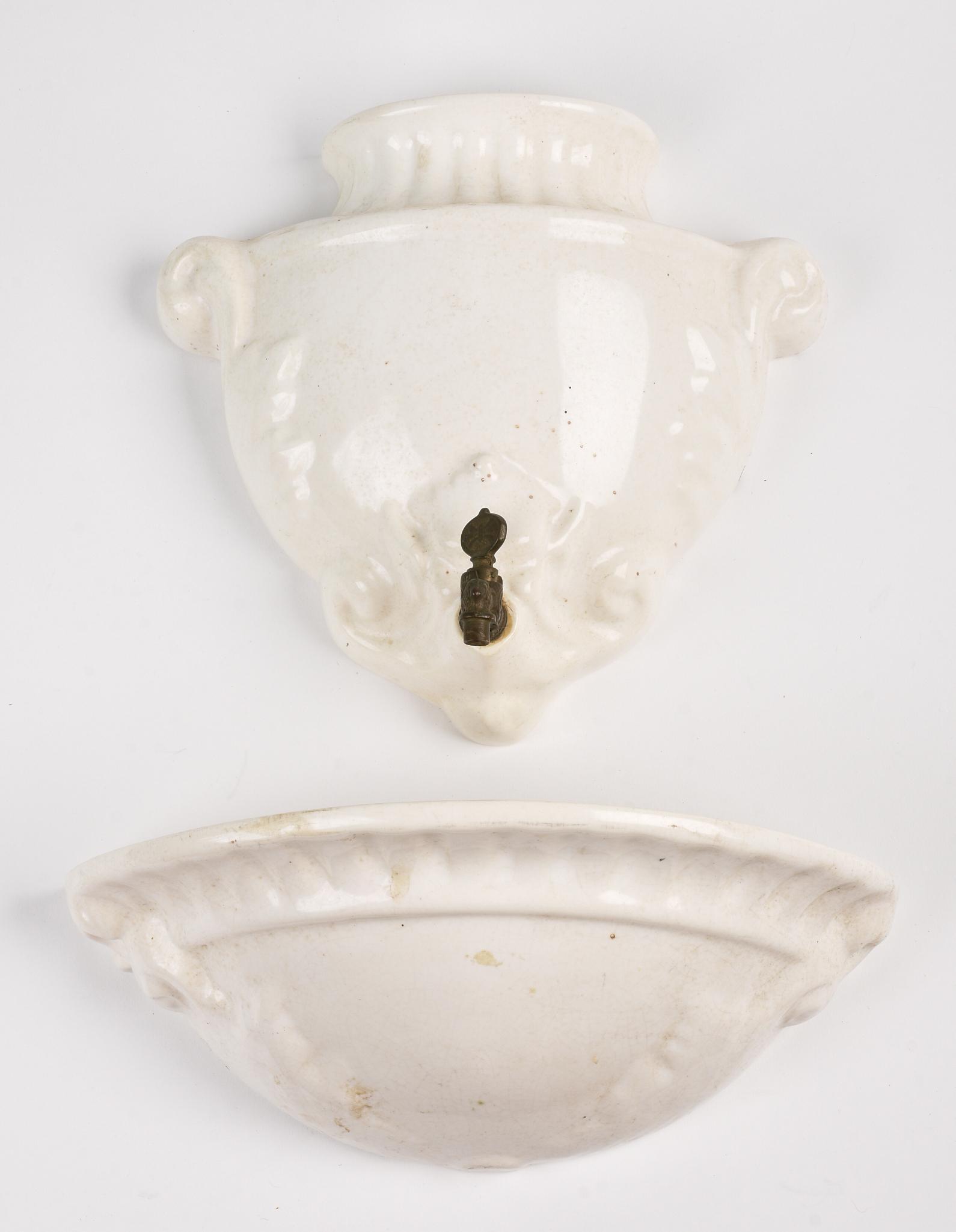 Italian Vitreous Porcelain Lavabo.: Height of top 10 inches, width of basin 13 inches.