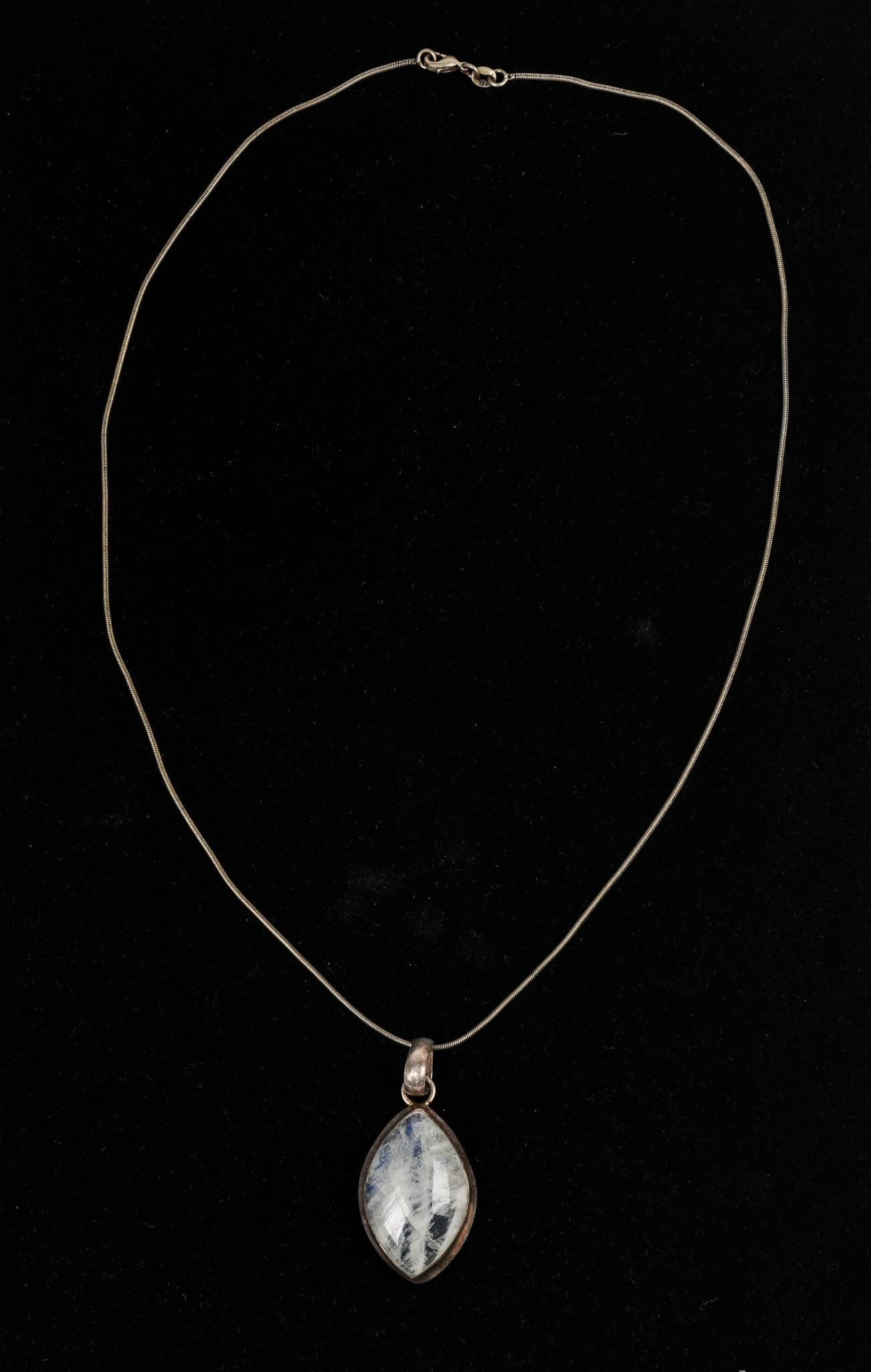 Sterling and Moonstone Pendant Necklace.: Pendant 1.75 x 0.875 inches, sterling chain 21 inches.