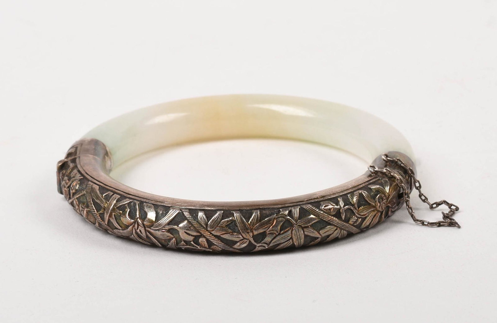 Jade and Sterling Bracelet.: Diameter 2.5 inches, 59 grams.