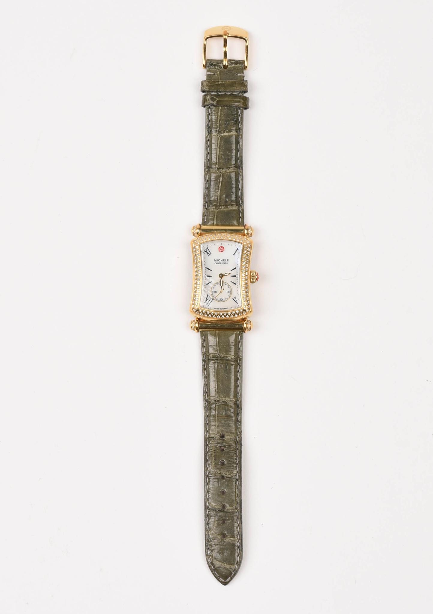 Michele Caber Park Lady's Watch With Diamonds.: .60 CT TW, 148 diamonds. Face 1.5 x 1 inches, with original crocodile leather strap. Not tested for operation, some wear to strap.