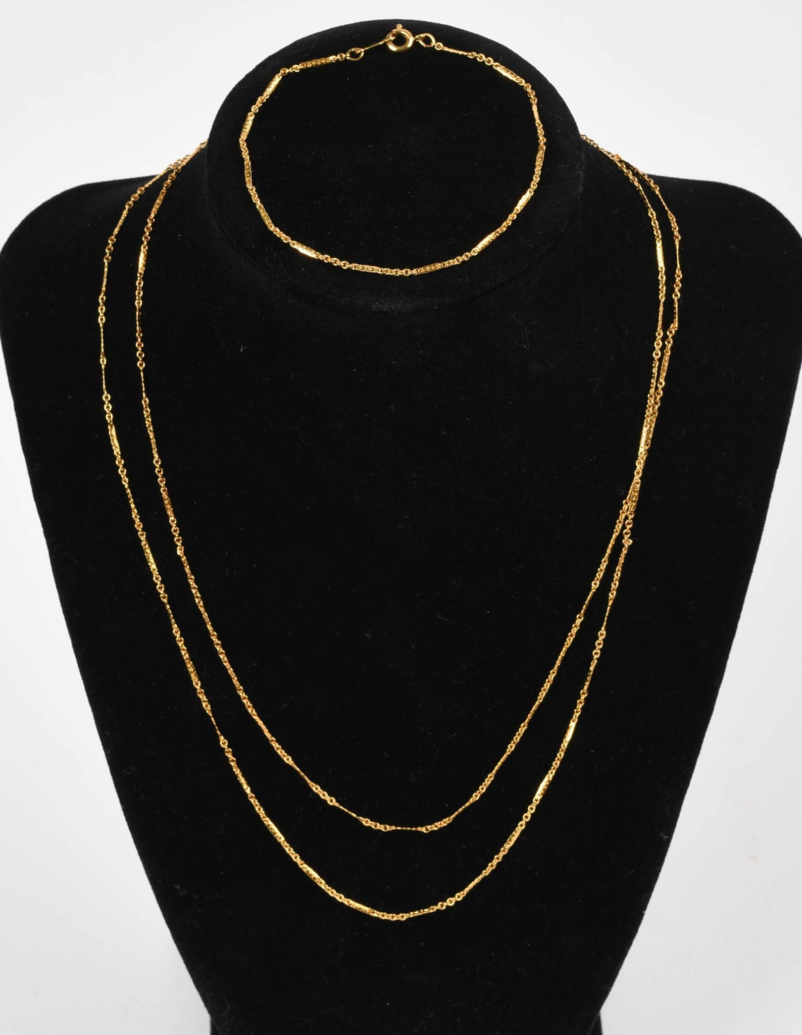 Gold Tone Sterling Necklace and Bracelet.: Length of necklace 34 inches, 6.1 grams.