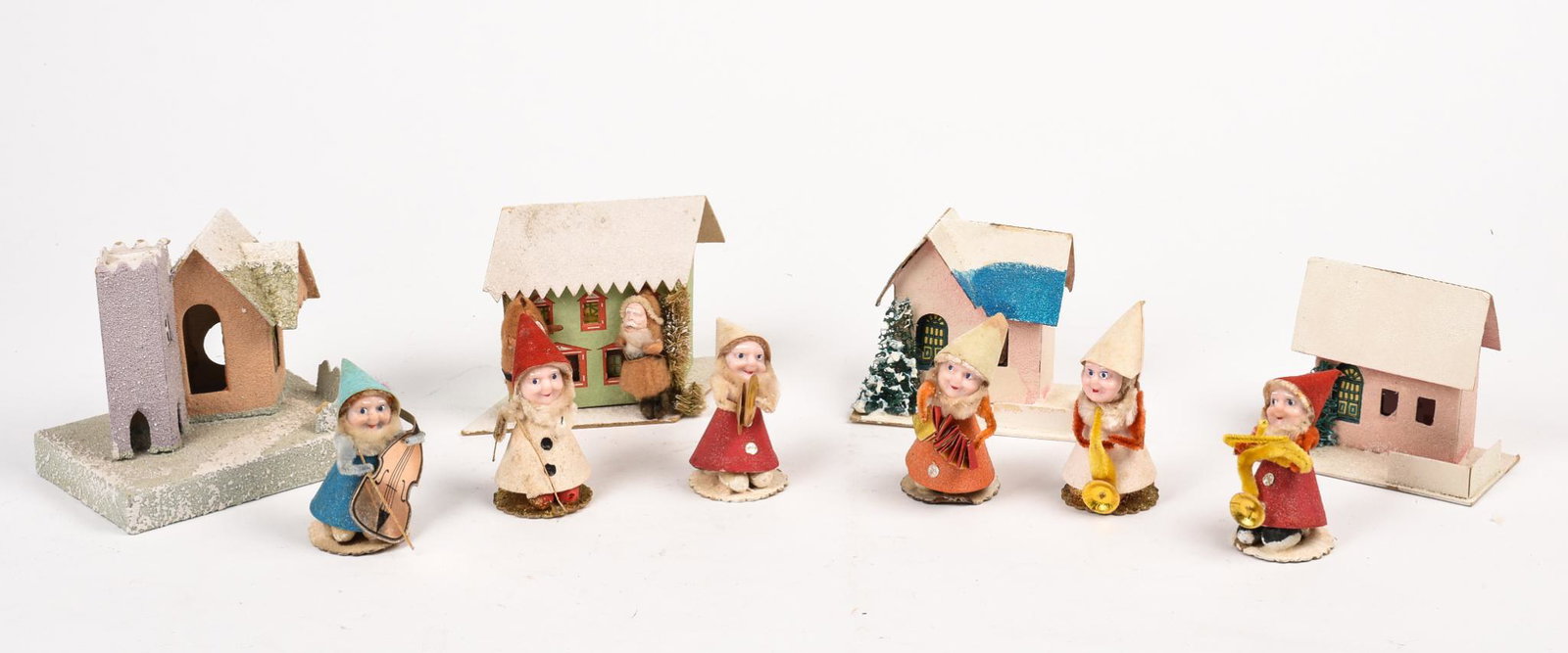 Japanese Gnome Band.: Six figures, height of each approximately 3 inches. Also includes four miniature houses.