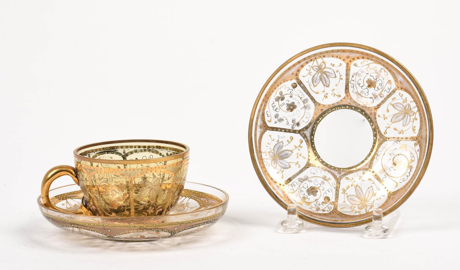 Gilt Overlay Teacup and Saucer.: Diameter of saucer 4.5 inches, together with a spare saucer.