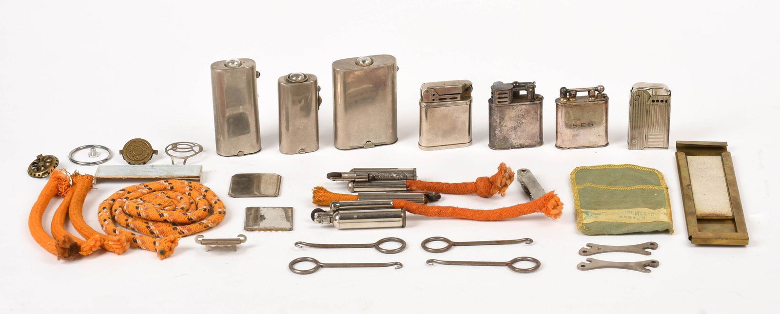 Collection of Lighters, and Other Accessories.: Regens, Douglass Lighter, Beattie Jet, French, Swiss, and English exampes. Together with two Everready flashlights, and other assorted pieces.