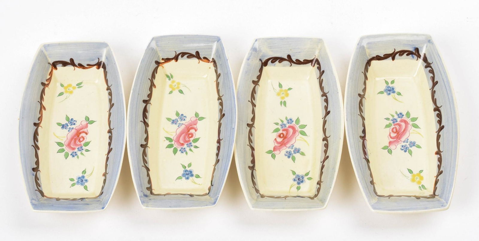Four Clarice Cliff Floral Decorated Sauce Bowls.: Each 6 x 3.25 inches.