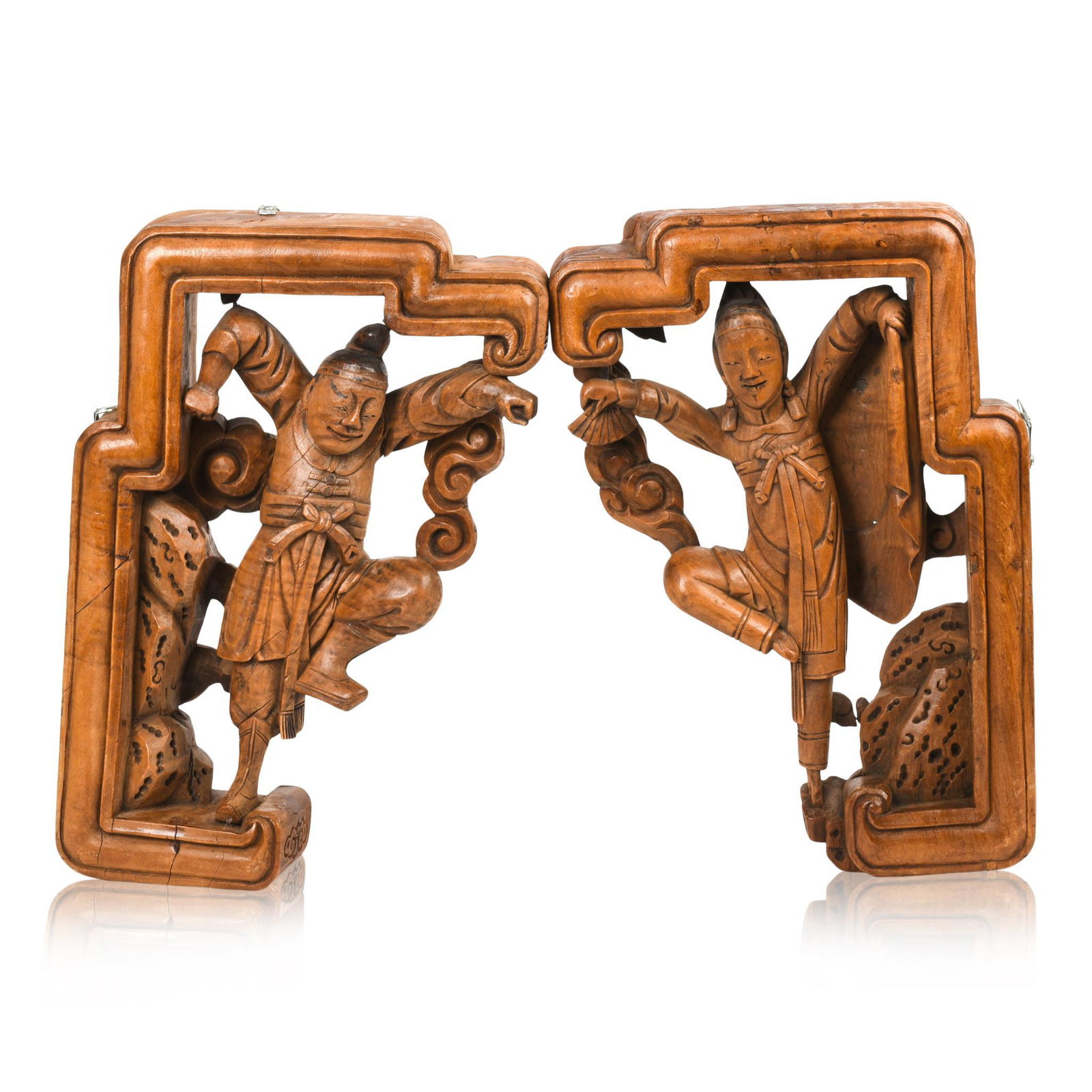 Pair of Chinese Wooden Corbels.: 19th century, each carved with a dancer, 16 x 11 inches.