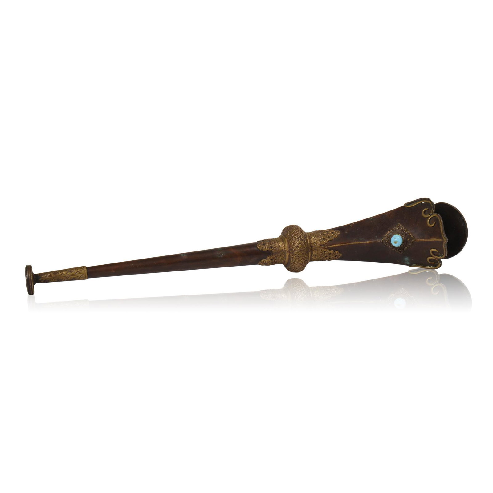 Tibetan Buddhist Ceremonial Horn: Brass and copper with repousse decoration, turquoise glass bead, length 24 inches.