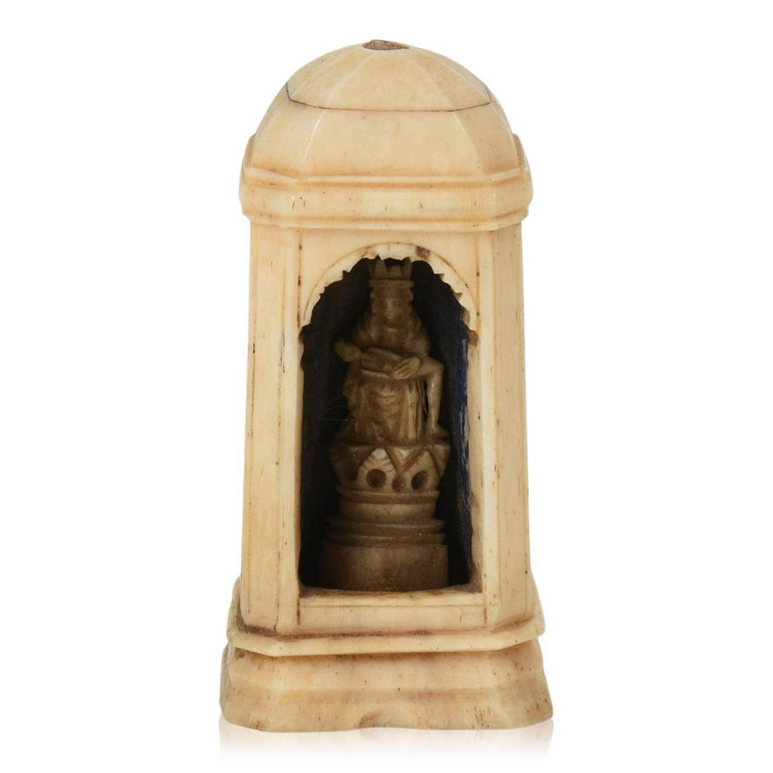 Miniature Carved Bone Shrine of Madonna and Child: European, 19th c., height 3.25 inches. Missing finial.