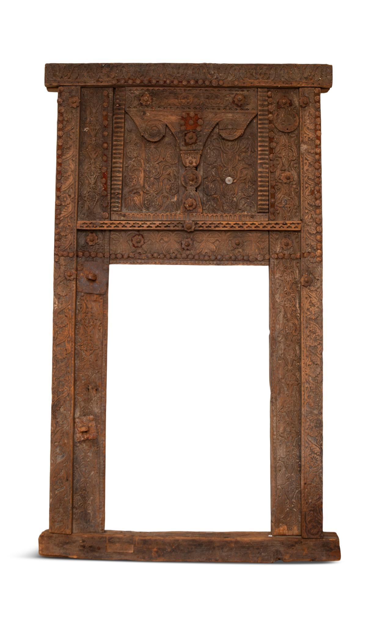 Three Carved Wooden Doors.: Possibly from a temple, one with a smaller opening, 74 x 43.5 inches, the other two 71 x 20 inches.