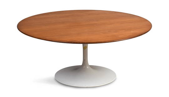 Eero Saarinen for Knoll Associates Tulip Coffee Table: Laminate top, enamel pedestal base, original Knoll label, height 15 inches, diameter of top 36 inches. NOTE: Due to its size, this item is not eligible for in house shipping. If shipping is requested,