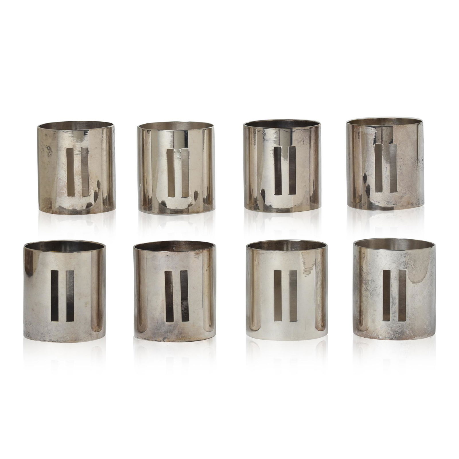 Eight Richard Meier for Swid Powell Napking Rings.: Silverplate, height 1.75 inches, diameter 1.5 inches.