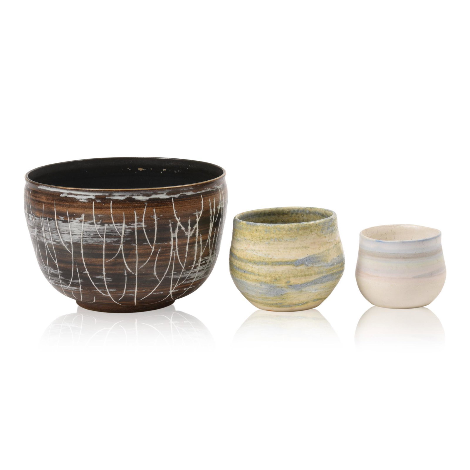 Three Sherry Mike Pottery Pieces.: A bowl, height 4.25 inches, and two mugs.