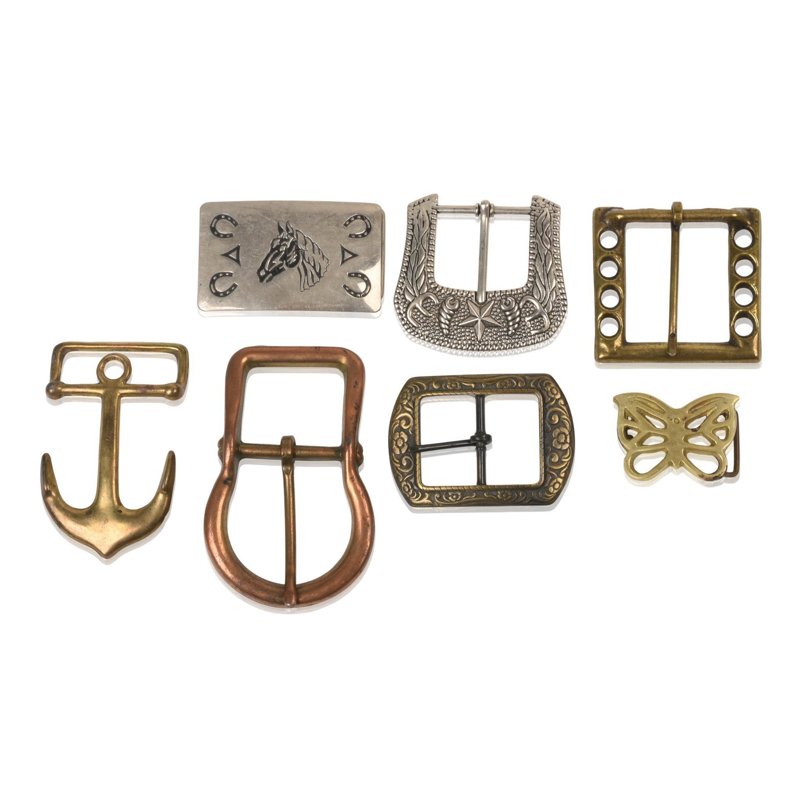 Five Vintage Brass Belt Buckles.: Length of largest 4.5 inches, together with a silverplate example.